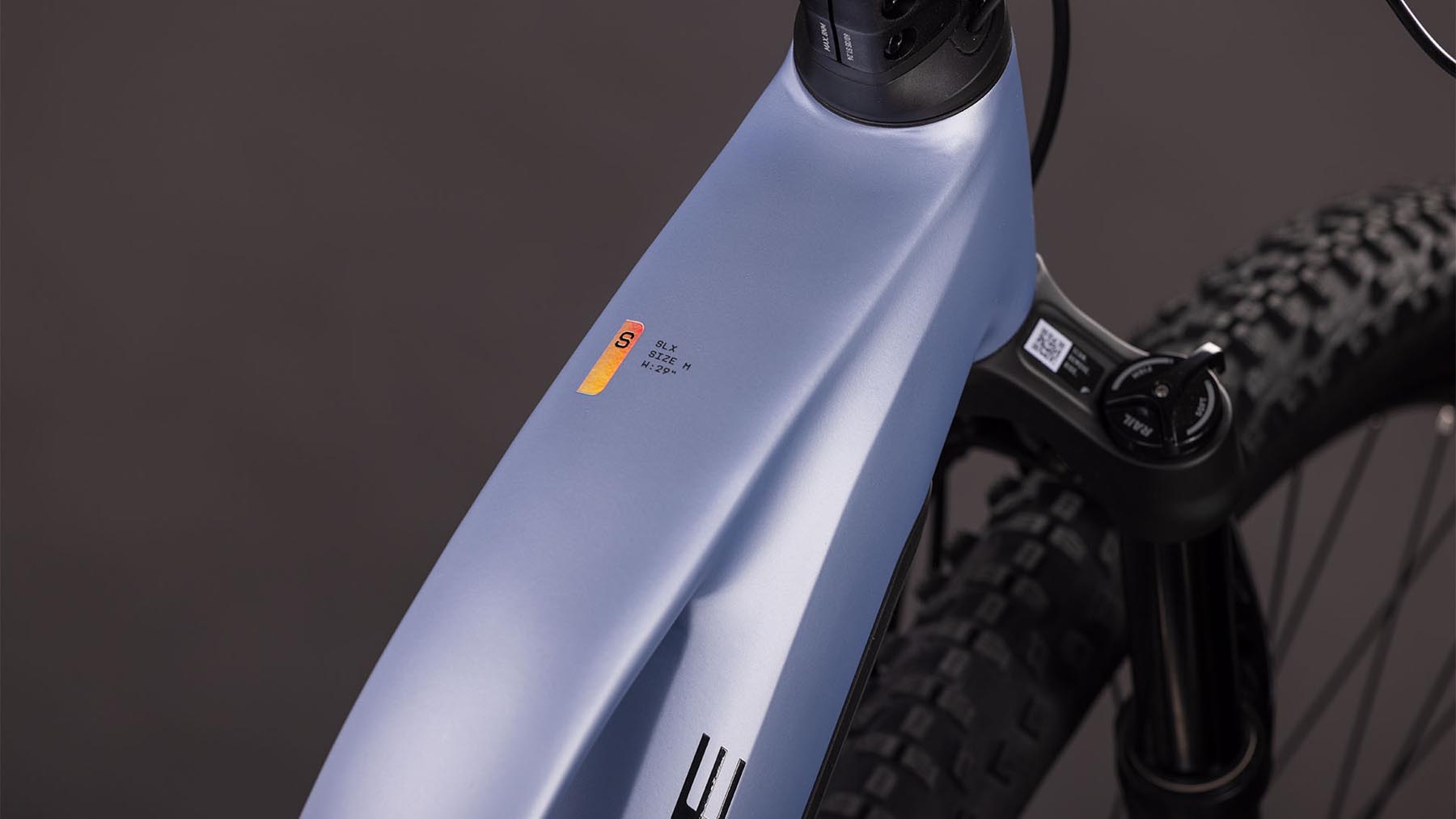 108611Z-Cube-Reaction-Hybrid-SLX-800-gauzegrey-n-iceblue-2026-EBike-Hardtail-Mountainbike-Damen-01