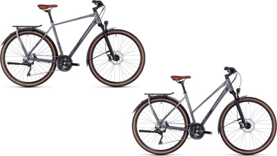 Zwei Cube Kathmandu SLX Fahrräder, eins mit Diamantrahmen und eins mit Trapezrahmen.